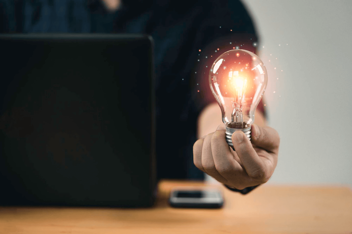 a guy holding lamp, meaning of idea or solution